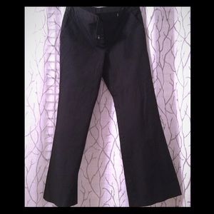 Black slacks, boot cut, zipper and clip closure